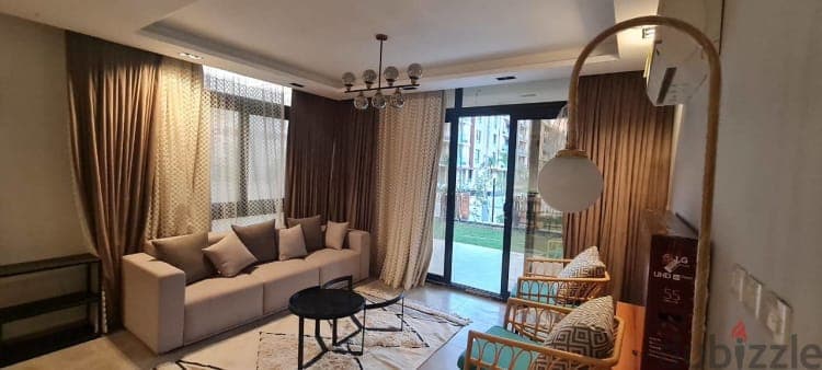 115 m2 Ground floor + garden Azad AUC - شقة بفروشة بكومباوند ازاد 1